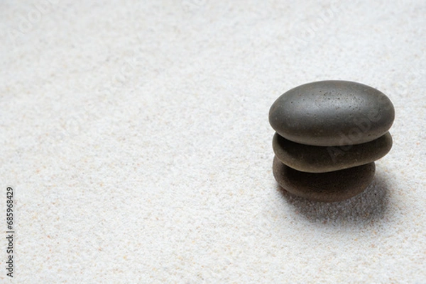 Fototapeta 	
Top view of three stones resting on sandstone balance concept, Japanese Zen garden