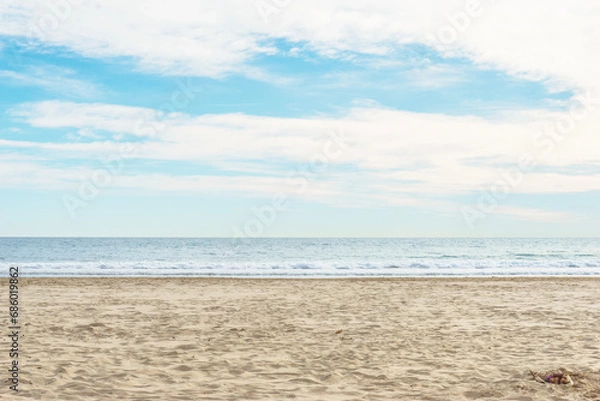 Fototapeta sand beach and cloudy sky