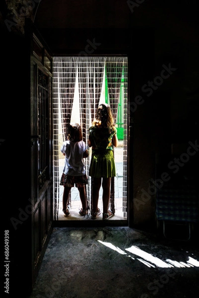 Fototapeta two children in the threshold