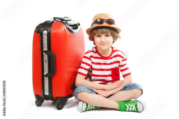 Obraz The summer boy sits with red trunk