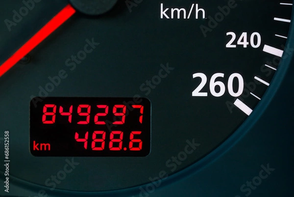 Fototapeta red digital odometer display of a old car with mileage 849,297 km