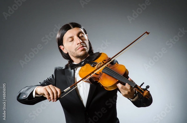 Fototapeta Man violin player in musican concept