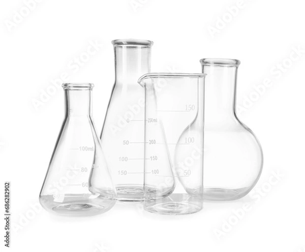 Fototapeta Many laboratory flasks and beaker isolated on white