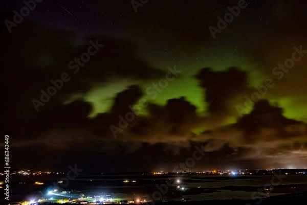 Fototapeta Night of one of the strongest Aurora Borealis above Dungloe and the island of Arranmore in County Donegal - Ireland