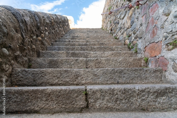 Fototapeta View up a staircase.