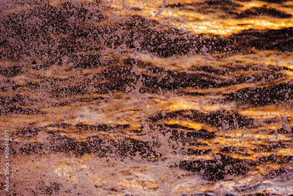 Fototapeta 해질녘에 튀어오르는 바닷물