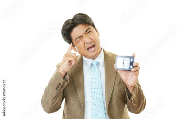 Fototapeta 遅刻するビジネスマン