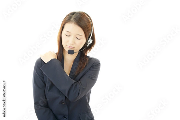 Fototapeta 疲れた表情のオペレーター