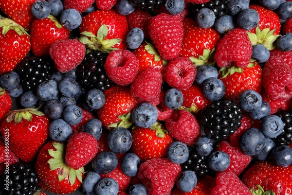 Fototapeta Assortment of fresh ripe berries as background, top view