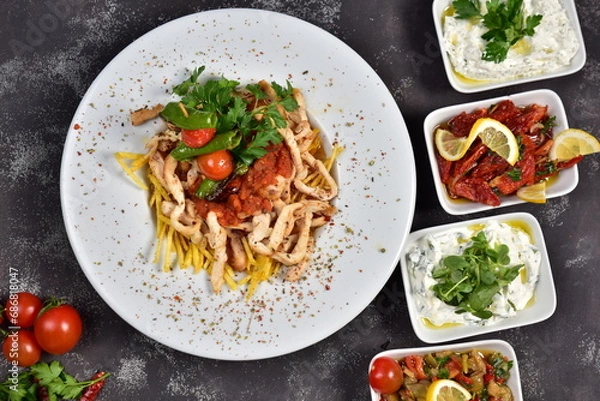 Obraz Chicken dinner and various appetizers