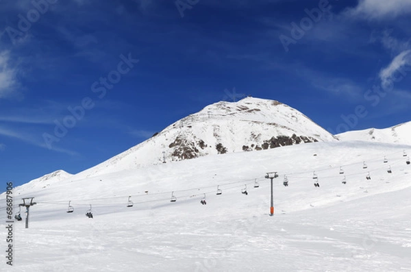 Obraz Panorama of ski resort at sunny winter day