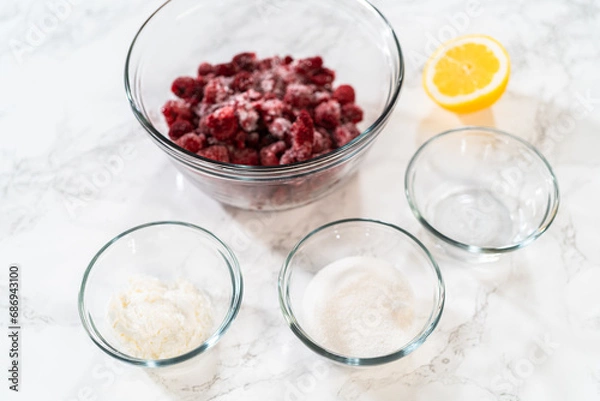 Fototapeta Raspberry Cake Filling-Measured Ingredients Await on Counter