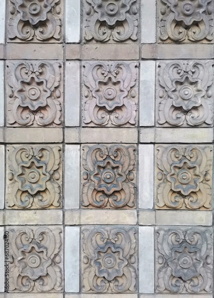 Obraz Wall stucco floral pattern detail on a building facade close-up