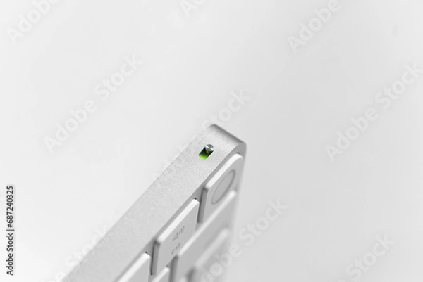 Fototapeta silver keyboard with fingerprint scanner on white background