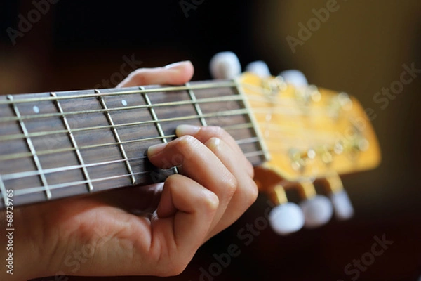 Fototapeta Playing guitar