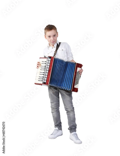 Obraz Young boy playing on accordion, isolated on white, clipping path