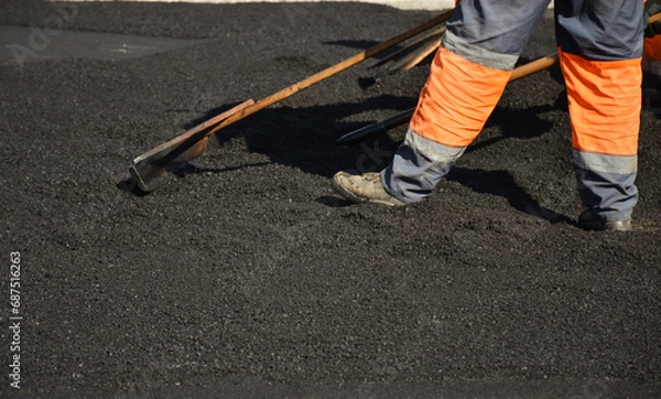 Obraz worker on asphalt