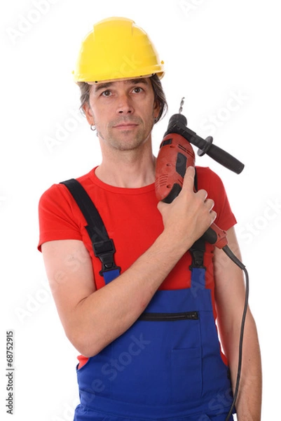Fototapeta worker with helmet and drilling machine