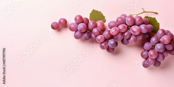 Fototapeta fresh red grape fruit healthy food concept Arrange a beautiful top view with space on a pastel pink background.