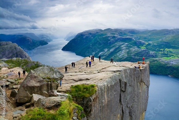 Fototapeta Preikestolen and surrounding area, Norway. Lysefjorden below. Unrecognizable people.