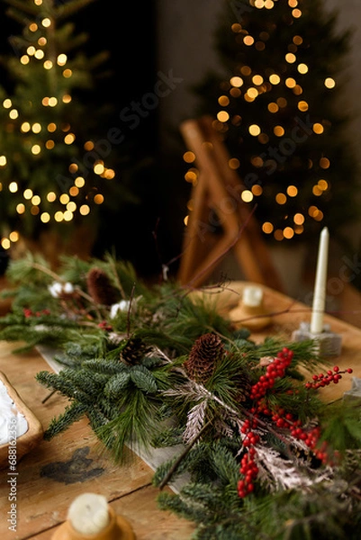 Obraz christmas table with candles and christmas decorations