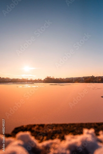Obraz sunset over the iced lake 