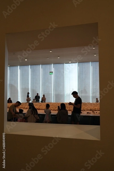 Obraz people are doing artwork in a conference hall