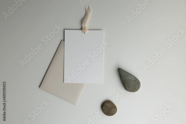 Obraz A composition with stones and a paper envelope with a postcard