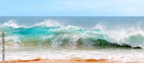 Obraz Blue and aquamarine color sea waves and yellow sand  with white foam. Marine beach background. Banner format.