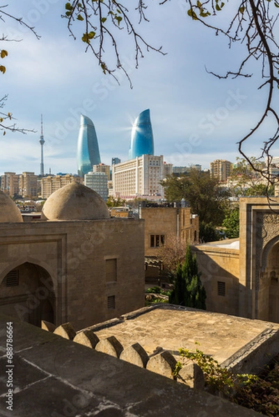 Fototapeta The panoramic view of the old town and modern buildings in Baku city, capital of Azerbaijan