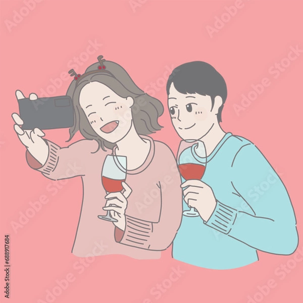 Fototapeta a couple taking a selfie with a bottle of wine