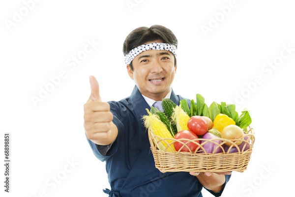 Fototapeta 野菜を持つ料理人