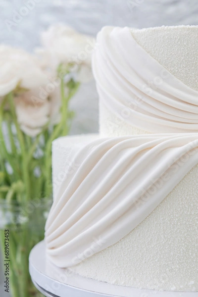 Fototapeta process making white wedding cake