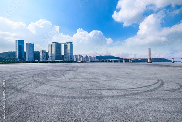 Fototapeta Asphalt road square and city skyline with modern buildings scenery in Zhuhai, Guangdong province, China.