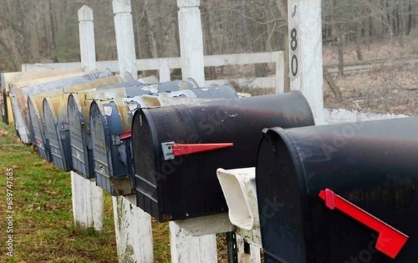 Obraz Rural mailboxes sit all in a row awaiting mail and news