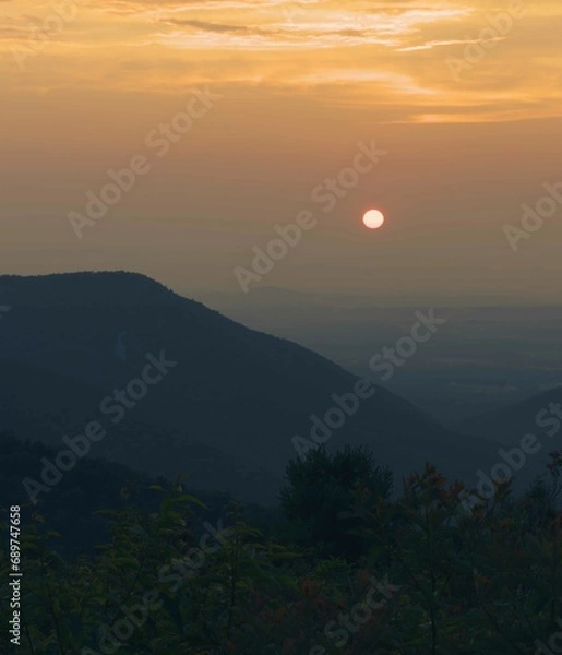 Obraz Abstract summer sunset in the Blue Ridge Mountains during blue hour.