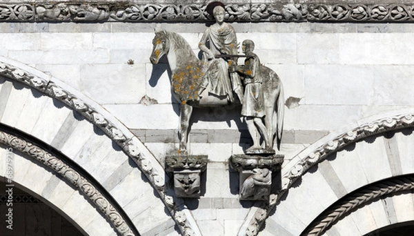 Fototapeta Statue of St. Martin sharing his cloak with a beggar