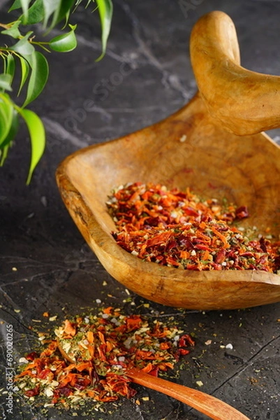 Obraz Oriental spices on a wooden background. Indian seasonings