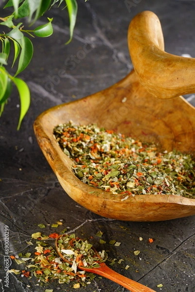 Obraz Oriental spices on a wooden background. Indian seasonings