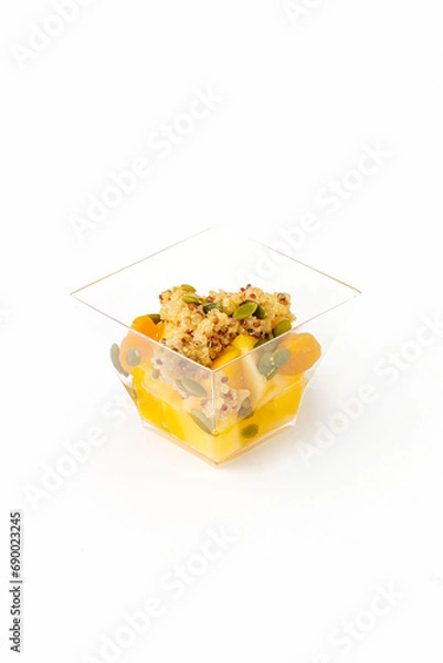 Fototapeta A small portion of vegetable salad on a white background