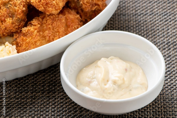 Obraz カキフライに添えらえたタルタルソース。
