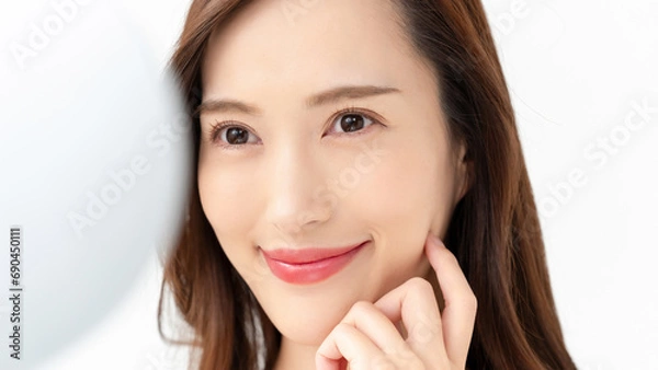 Obraz スキンケアをする女性