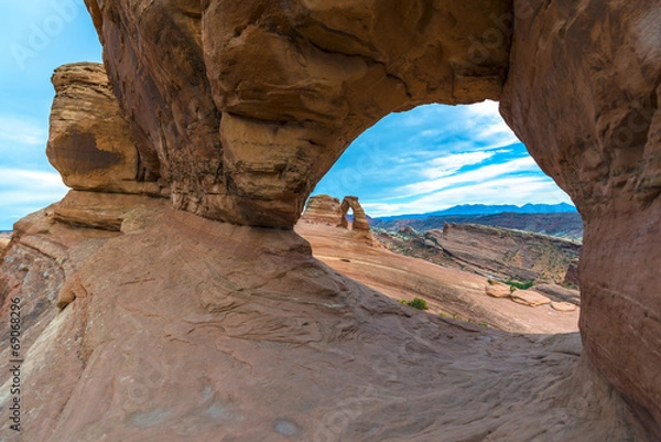 Fototapeta Beautiful sunset sky with view Delicate Arch through Window