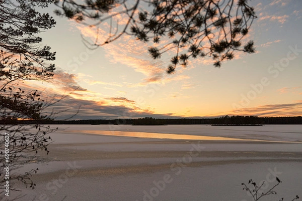 Obraz winter lake with snow at sunset