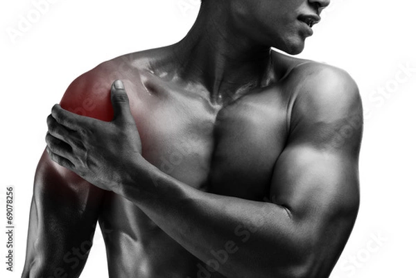 Obraz young muscular man with shoulder pain , isolated on white backgr