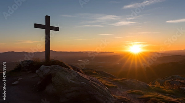 Obraz Christian cross on top of a hill facing the rays of a new dawn rising from the horizon. Symbolic of the resurrection of Jesus Christ, hope through faith, a new beginning.