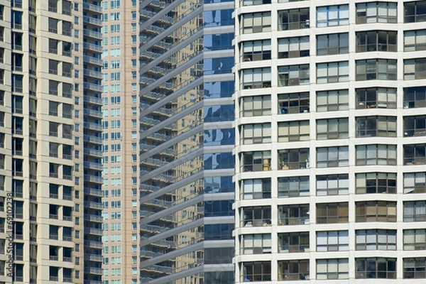Fototapeta Close view of Chicago skyscrapper with abstract windows pattern
