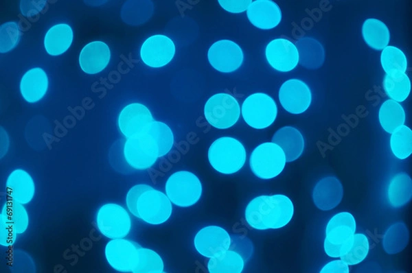 Fototapeta Abstract background - bright blue lights bokeh