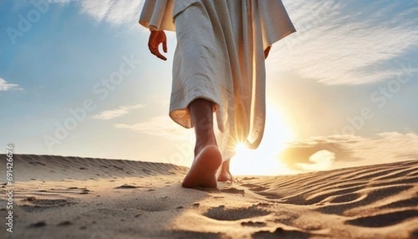 Fototapeta Close-up of the feet of man walking on the sand towards the rising sun. Generated with AI