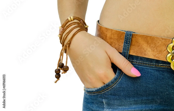 Obraz hand with a bracelet in a pocket of jeans
